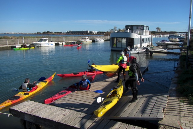 A floating dock makes launching easy. In the distance is Palava-les-Flots and the mouth of the river.